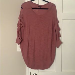 Sweater with open cuts on arms